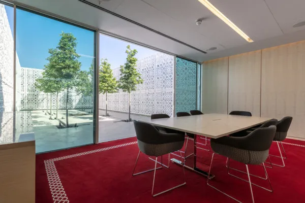 An executive meeting room facing out into the Garden of Light.