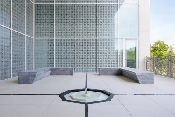 The Garden of Tranquillity featuring a marble space with a fountain in the centre.
